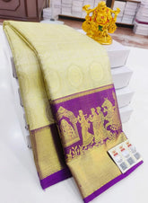Pastel Gold Kanchipuram 100% Silk Saree with Purple Zari Border & Wedding Scene Motifs VR MISS | Sarees that defines you