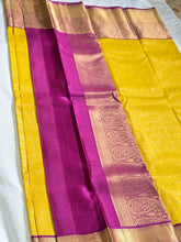 Sunshine Yellow Kanchipuram Silk Saree with Pink Paisley Zari Pallu