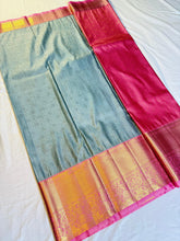 Turquoise Bliss Kanchipuram Pure Silk Saree with Rani Pink Zari Border