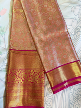 Traditional saree with intricate patterns on a white background