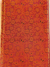 Red fabric with black floral pattern
