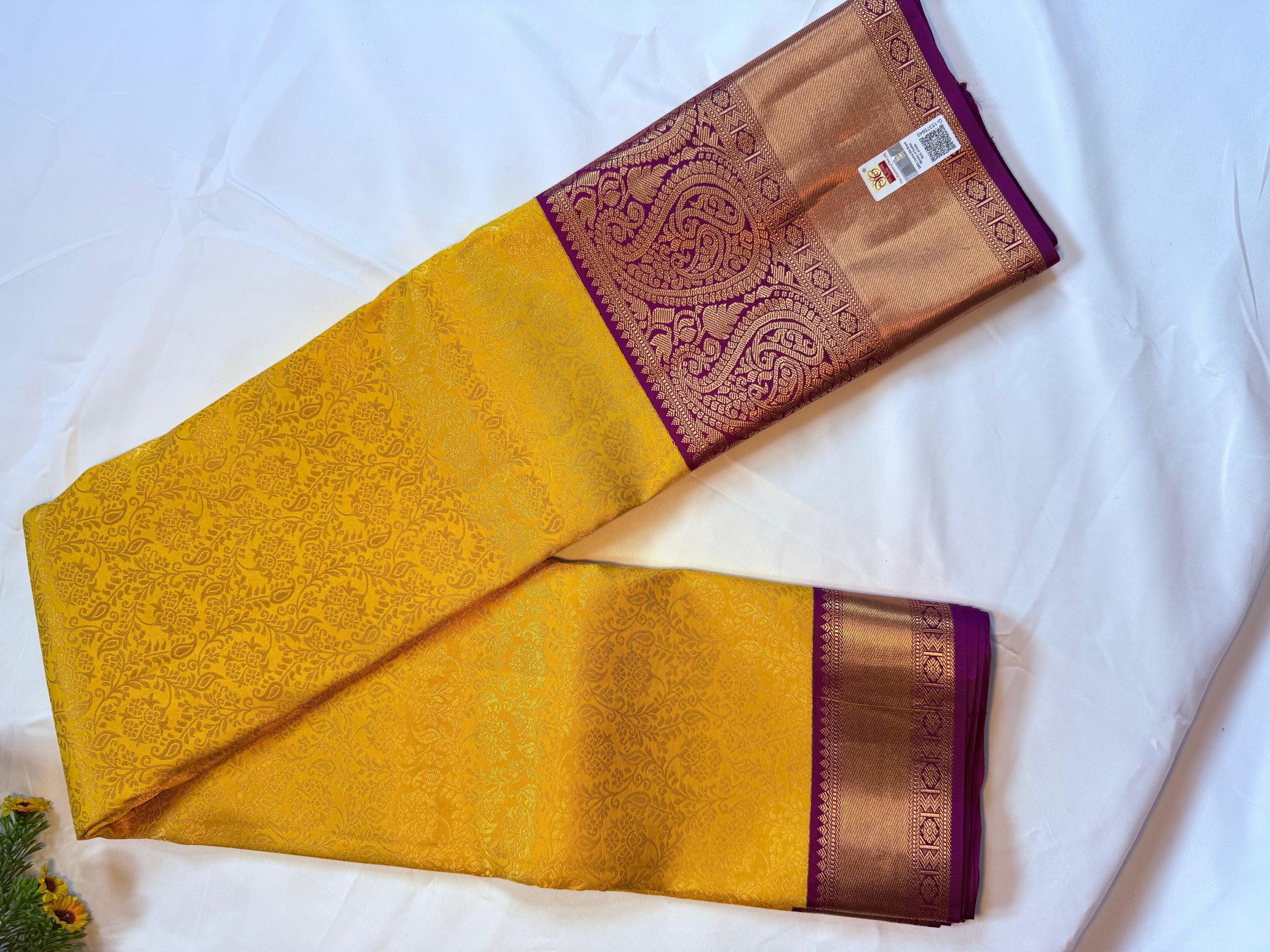 Sunshine Yellow Kanchipuram Silk Saree with Pink Paisley Zari Pallu