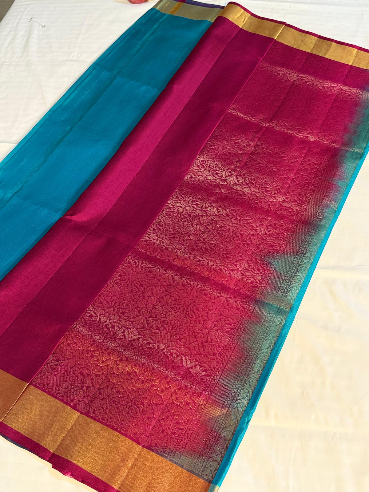Teal Blue Kanchipuram Silk Saree with Rani Pink Floral Zari Pallu