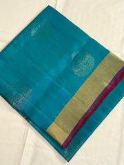 Teal Blue Kanchipuram Silk Saree with Rani Pink Floral Zari Pallu
