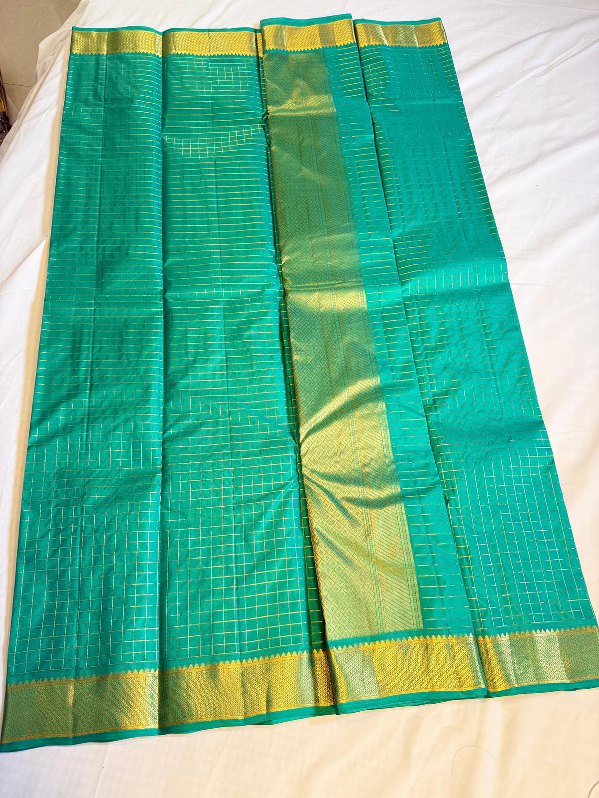 Parrot Green Kanchipuram Silk Saree with Lustrous Golden Zari Checks & Temple Border