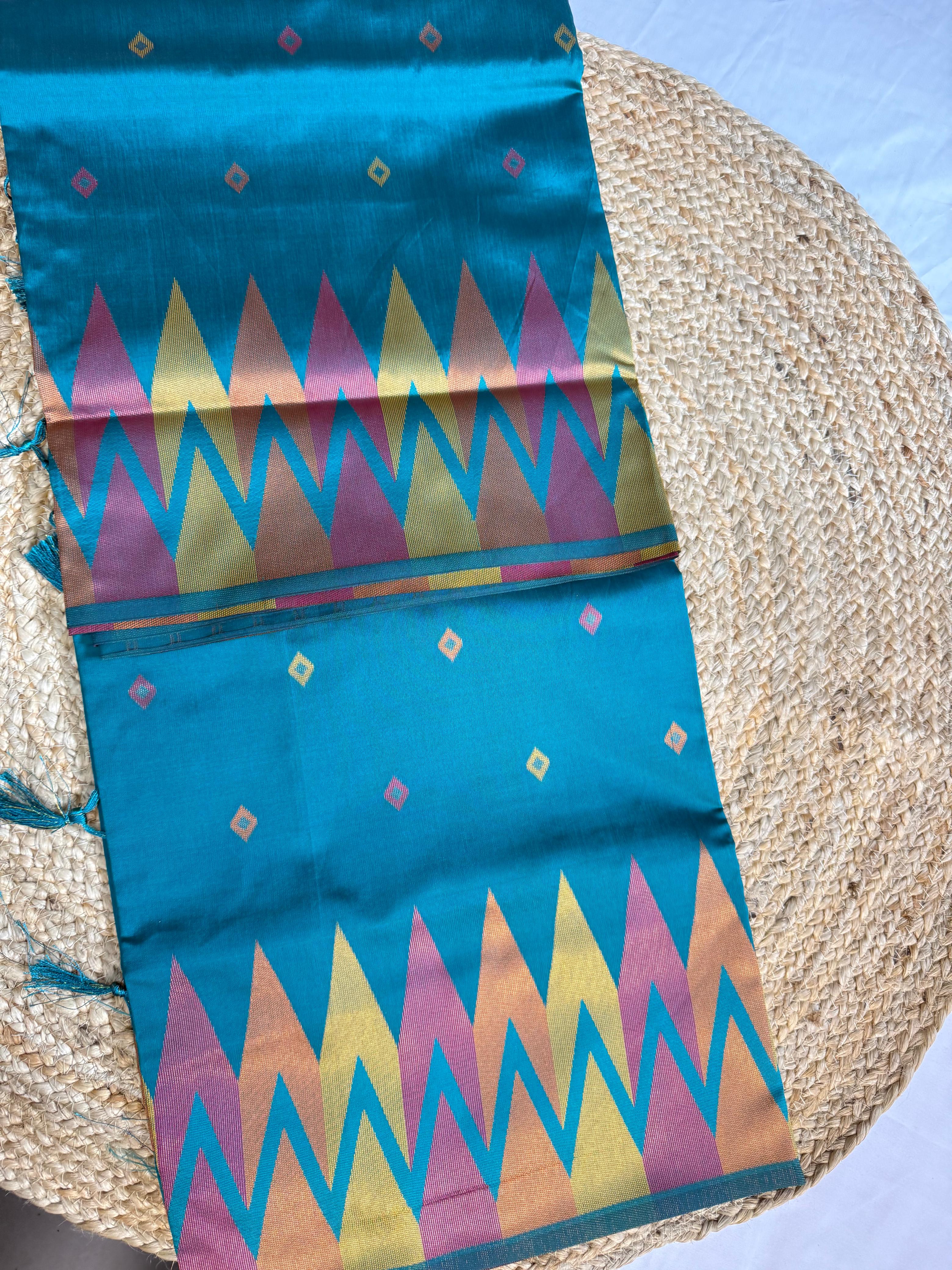Teal Green Kanchipuram Silk Saree with Ikat-Inspired Geometric Pallu & Multicolor Zari Play