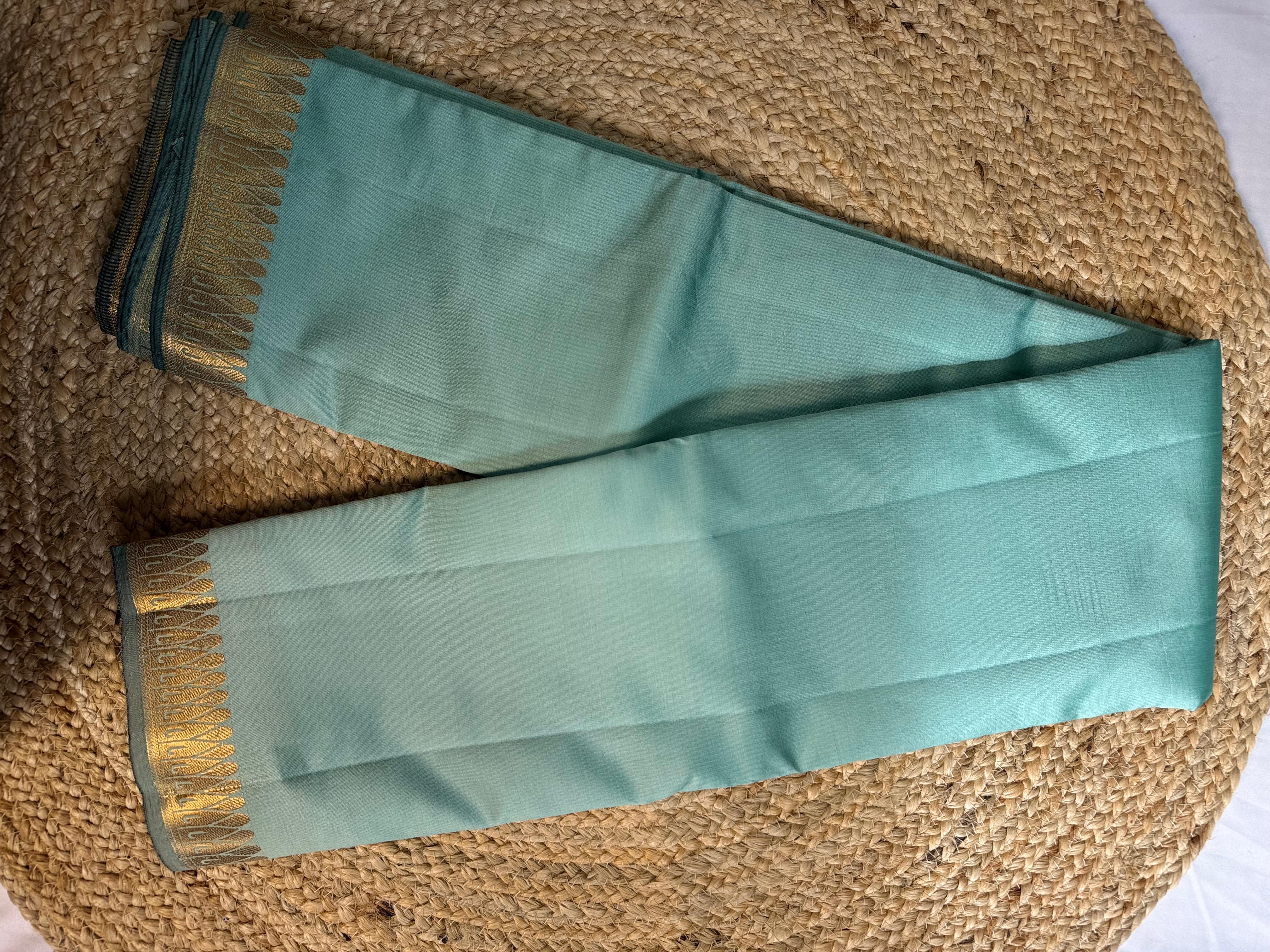 Sea Green Kanchipuram Silk Saree with Black Striped Pallu & Golden Temple Border
