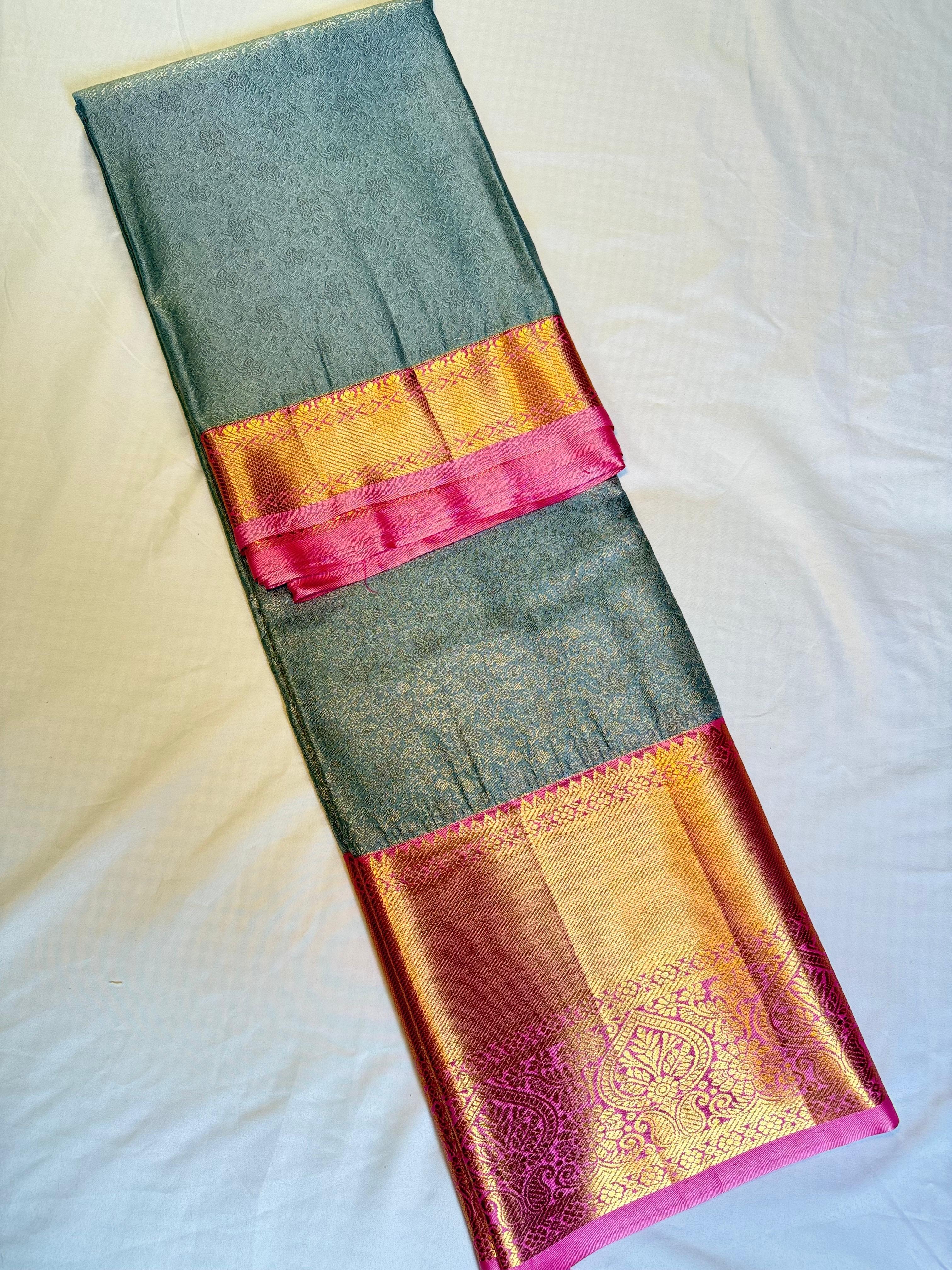 Turquoise Bliss Kanchipuram Pure Silk Saree with Rani Pink Zari Border