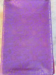 Purple fabric with floral pattern on a white background