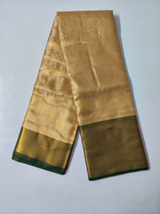 Golden Soft Silk Saree with Green Contrast Border & Floral Zari Weaving